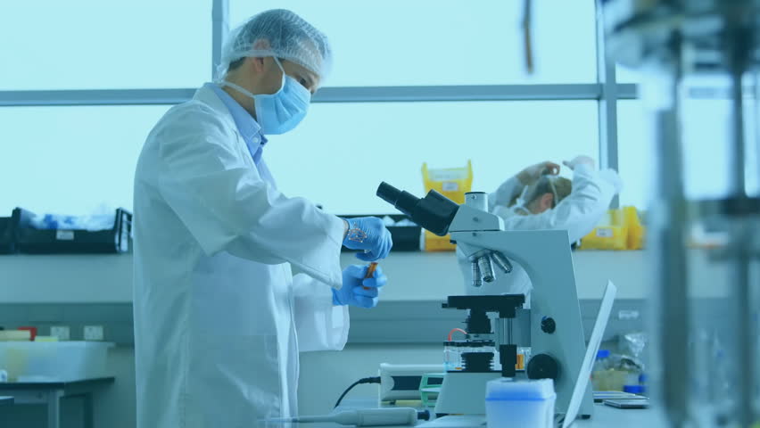 Animation of network of medical icons over diverse scientists working at laboratory. Connection, science, medical research, digital interface and communication, digitally generated video. - Powered by Shutterstock - Get 15% off with code: PIKWIZARD15