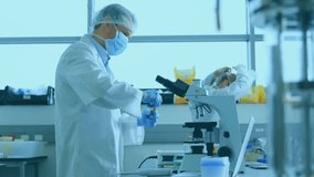 Animation of network of medical icons over diverse scientists working at laboratory. Connection, science, medical research, digital interface and communication, digitally generated video. - Powered by Shutterstock - Get 15% off with code: PIKWIZARD15