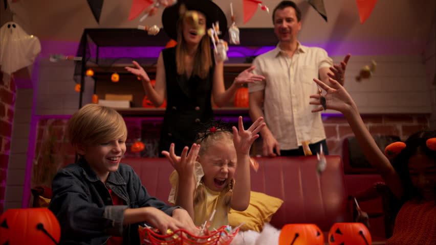 Parents and children are enjoying the halloween celebration party