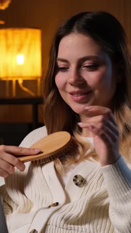 Smiling Woman Singing With Hairbrush Spending Freetime Using Laptop At Home