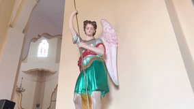 Saint Michael the archangel statue in the church, catholic   - Powered by Shutterstock - Get 15% off with code: PIKWIZARD15