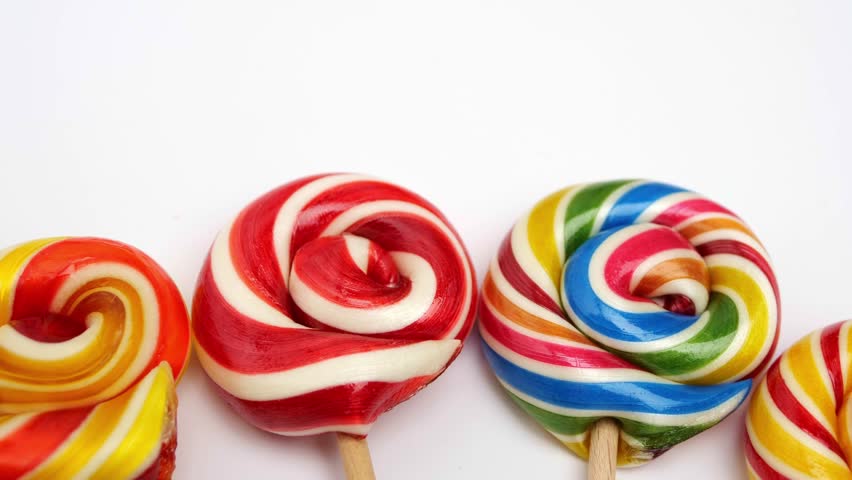 Set of colorful lollipops isolated on white. sucker and unhealthy food. rainbow lollypop. multi colored confectionery and lollipop candys background