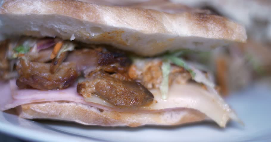 Cuban Sandwich rotating on a turning table big close up 1