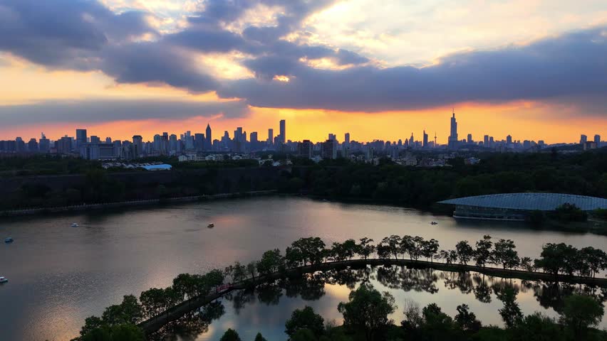 Qianhu Park under the Ming Dynasty city wall in Nanjing at sunset in autumn