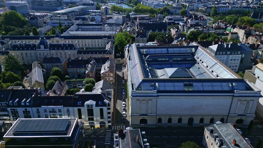 Smooth sideways aerial movement about the Nantes Art Museum and Clémenceau High School, Nantes, France.