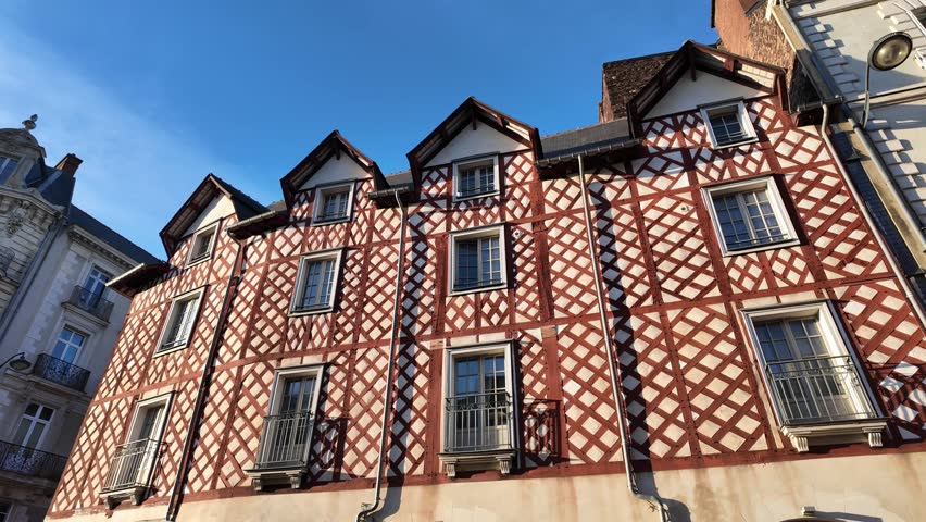 Outside view about a traditional and historical half-timbered building in Rennes, France.