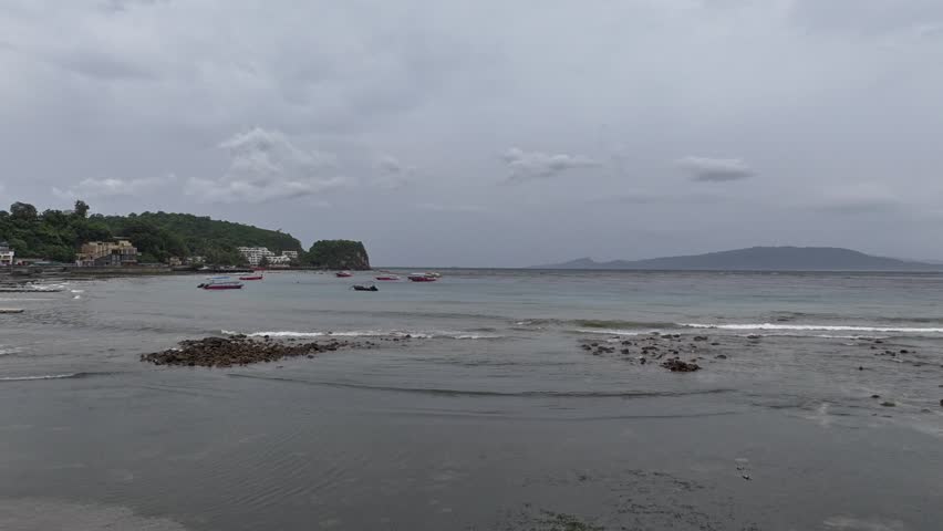time lapse of Puerto Galera Bay activity on a cloudy day