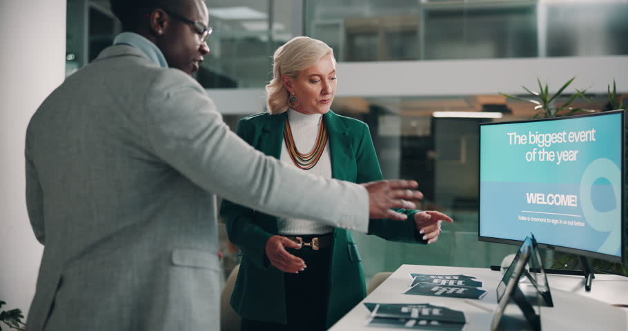 Conference, conversation and introduction with business people in office together for tradeshow event. Computer, lobby or welcome with employee man and woman talking for intro to corporate seminar