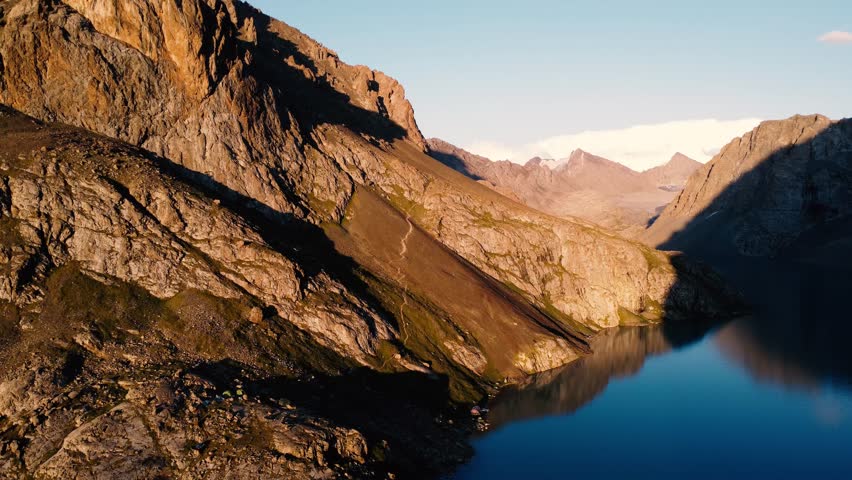 Sunset over the mountain lake