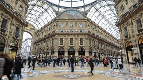 MILAN, ITALY - MARCH 23: (Timelapse View) People Shopping in Vittorio Emanuele II Gallery on March 23, 2013 in Milan. The Gallery is the oldest shopping mall in Italy, built between 1865 and 1877.