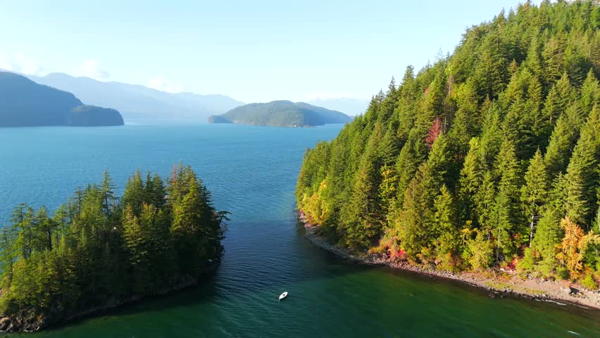 Smooth flight over The Harrison Lake. British Columbia, Canada