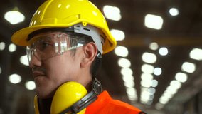 Close up technician worker wearing and adjust  ear protection, protective headphones, ear muff. Safety equipment for industry factory. Safety at work concept. - Powered by Shutterstock - Get 15% off with code: PIKWIZARD15