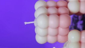 vertical video. Cute white and pink Bubble candles on purple background. items for New Year's interior decor. - Powered by Shutterstock - Get 15% off with code: PIKWIZARD15