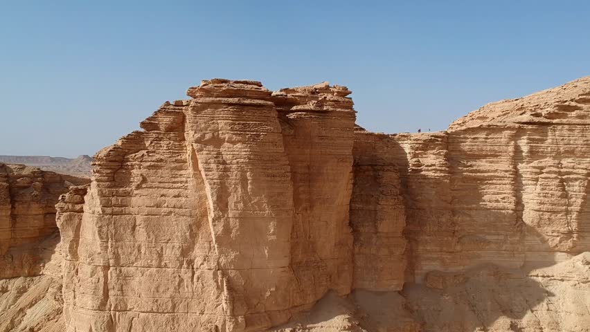 Camera drone ascends above Edge of the World, a popular tourist destination near Riyadh