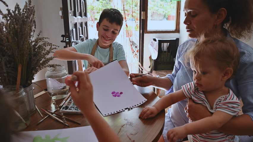 Family crafting at home table