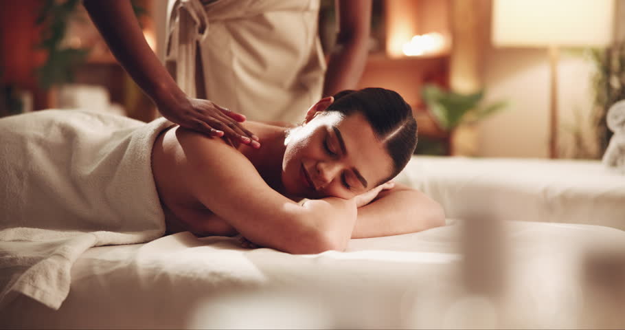 Hands, girl and happy with back massage at spa for muscle tension, luxury treatment and body pamper. Wellness, masseuse and apply shoulder pressure on client for pain relief, relax or healing therapy