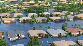 Flooding in Florida caused by tropical storm from hurricane rainfall. Suburb houses in residential community surrounded by flood waters. Aftermath of natural disaster - Powered by Shutterstock - Get 15% off with code: PIKWIZARD15