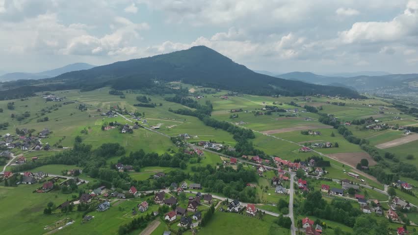 Aerial panorama of Kasina Wielka village in Beskid Wyspowy mountains in Southern Poland