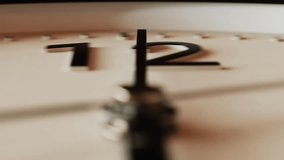 Close-up macro shot time-lapse of black and white classic wall clock, soft sunlight, moving shadows from window blinds, camera locked on moving minute hand - Powered by Shutterstock - Get 15% off with code: PIKWIZARD15