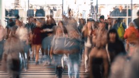 Time-lapse unrecognizable people crowd crossing city street, busy crossroad intersection, blurry pedestrians walking crosswalk in evening. Rush hour many people walk, blurred fast motion - Powered by Shutterstock - Get 15% off with code: PIKWIZARD15