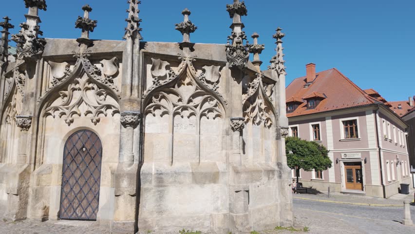 Late Gothic stone fountain in Kutná Hora served as a reservoir, supplying the town with drinking water. Pan Left Shot
