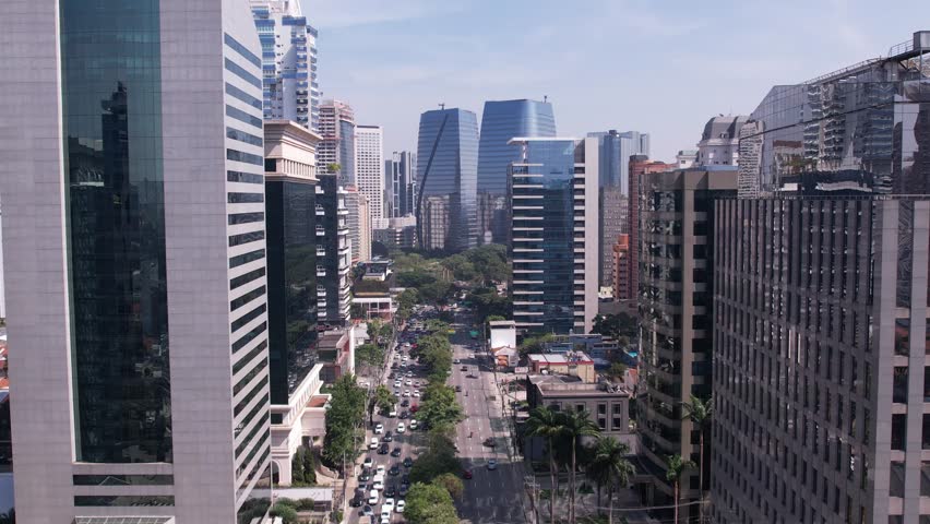 Aerial view of Avenida Brigadeiro Faria Lima, Itaim Bibi. Iconic commercial buildings in the background.