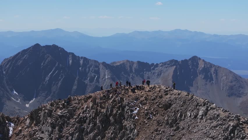 Collegiate Peaks Huron Peak summit 14er hike climb summer fall autumn Rocky Mountains Colorado drone aerial Three Apostles Ice Mountain La Plata Buena Vista sunny blue sky snow static shot