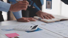 Business Financial Analysts Reviewing Financial Reports Using Digital Tools During Corporate Meetings, Planning Investment Projects, and Collaborating to Discuss Team Success in Business Strategies - Powered by Shutterstock - Get 15% off with code: PIKWIZARD15