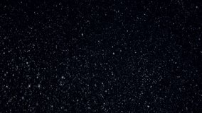 Falling natural snowflakes isolated on a black background, a lot of falling chaotic snow for any winter project. - Powered by Shutterstock - Get 15% off with code: PIKWIZARD15