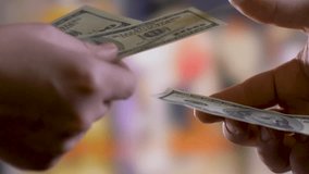 Man's hands ask and forcefully take cash money from woman's hands. Bribary concept - Powered by Shutterstock - Get 15% off with code: PIKWIZARD15