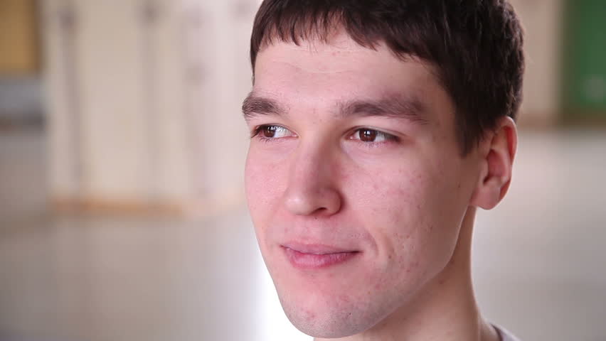 portrait of a handsome young guy in the gym 4