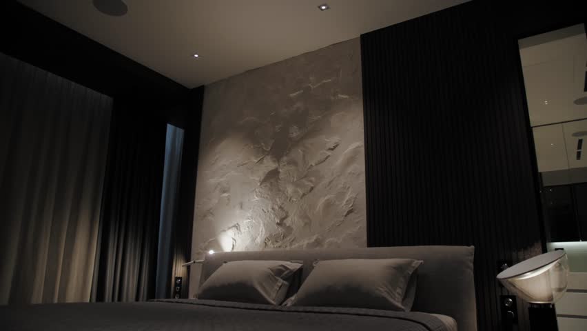 Explore a Modern Bedroom featuring Stylish Lighting and Elegant Decor for a Cozy Space