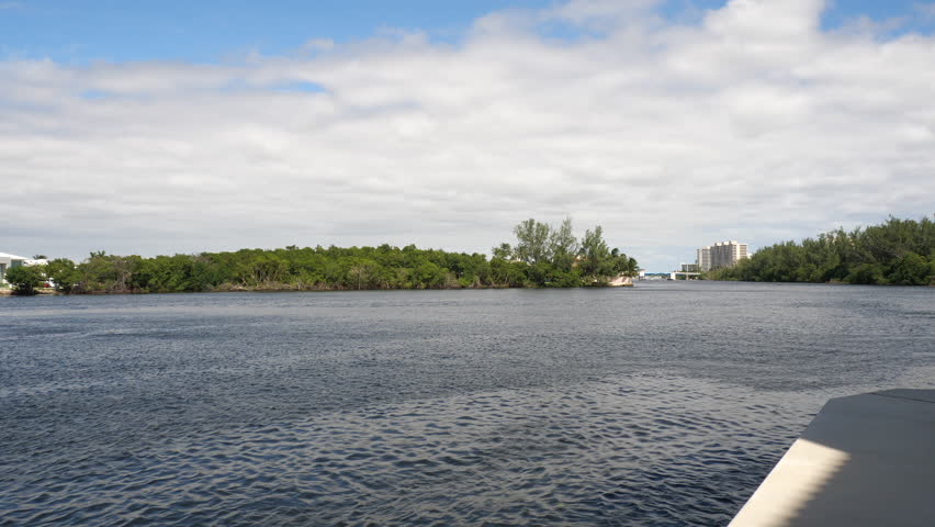 Right-to-Left Pan Across Multi-Million Dollar Homes on the Intracoastal Waterway across from San Remo in north Boca Raton, Florida