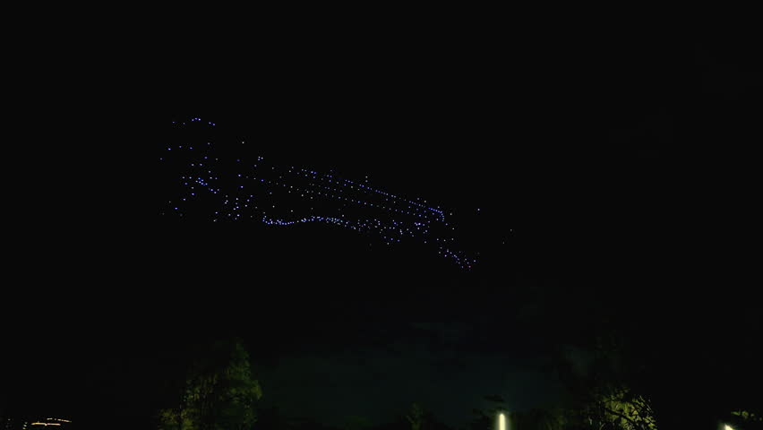Shenzhen, Guangdong, China, October 4, 2024,
Drone light show during National Day, drones
arranged in the sky like a moving ship, 4k