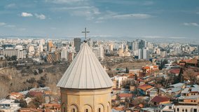 Tbilisi, Georgia. Georgian Capital Skyline Cityscape 4k Time Lapse Timelapse. Elevated Top View Georgian Church. Cumulus Clouds Above Residential Areas Of Tbilisi. Aerial View Residential Areas. Time - Powered by Shutterstock - Get 15% off with code: PIKWIZARD15