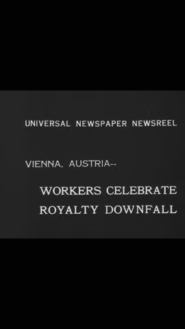 1918 - workers, including policemen, celebrate the royalty downfall in vienna, austria by parading.