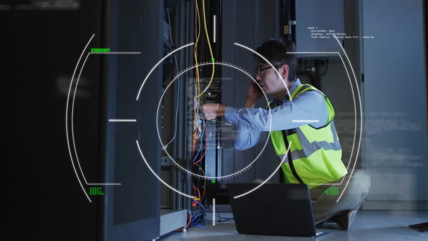 Animation of scanner and charts processing over asian male technician using phone in server room. Connection, data, processing, digital interface and global communication, digitally generated video. - Powered by Shutterstock - Get 15% off with code: PIKWIZARD15