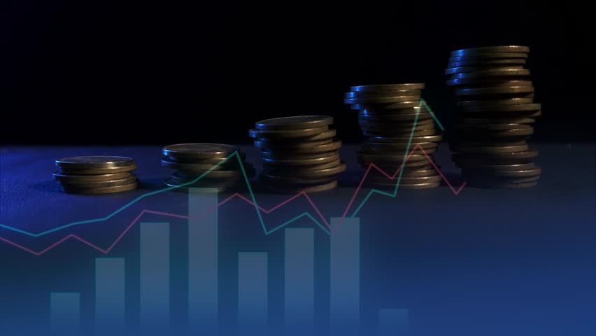 Graph and rows of coins for finance concept. Time lapse of gold coins piling up
