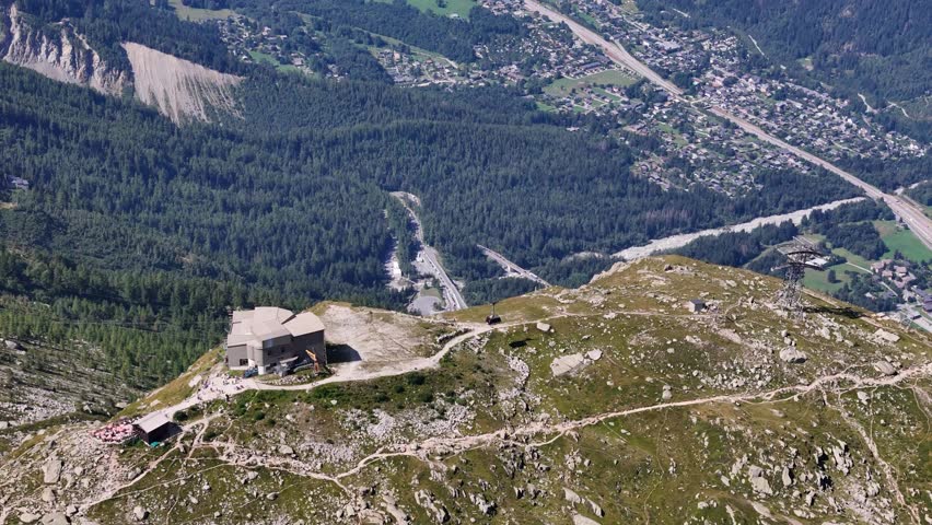 Aerial view of a cable car to Aiguille du Midi mountain in The Alps, France