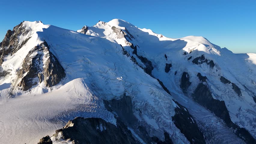 The summit of Mont Blanc seen from Aiguille du Midi mountain, France
