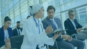 Animation of data processing over diverse colleagues talking at meeting. Global business and digital interface concept digitally generated video. - Powered by Shutterstock - Get 15% off with code: PIKWIZARD15