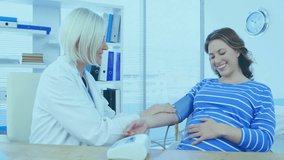 Animation of data processing and diagrams over caucasian female doctor talking with pregnant patient. Global medicine and digital interface concept digitally generated video. - Powered by Shutterstock - Get 15% off with code: PIKWIZARD15