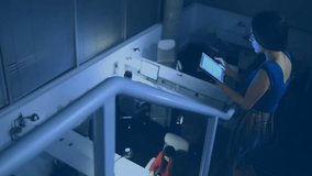 Animation of network of connections with icons over biracial woman using tablet in office. Global business and digital interface concept digitally generated video. - Powered by Shutterstock - Get 15% off with code: PIKWIZARD15