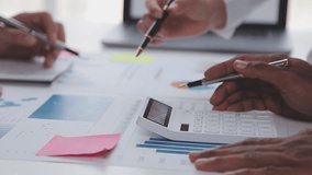 Financial Analysts Reviewing Business Financial Data on Digital Tablets, Collaborating on Investment Projects During Corporate Meetings, and Celebrating Team Success in Achieving Strategic Business - Powered by Shutterstock - Get 15% off with code: PIKWIZARD15