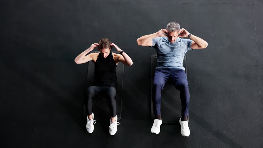 Couple Excercising. Core Fitness Workout. Crunch Training