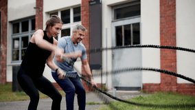 Active Couple Exercising Doing Rope Training Outside - Powered by Shutterstock - Get 15% off with code: PIKWIZARD15