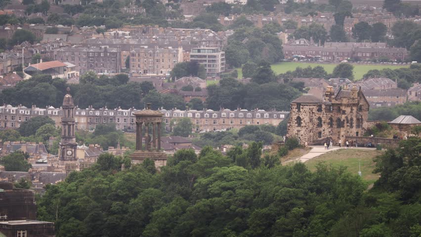 aerial view of Calton Hill from highland of Edinburgh Scotland with cloud of tour tourism travel on famous landmark of Edinburgh City, Scotland, UK, United Kingdom