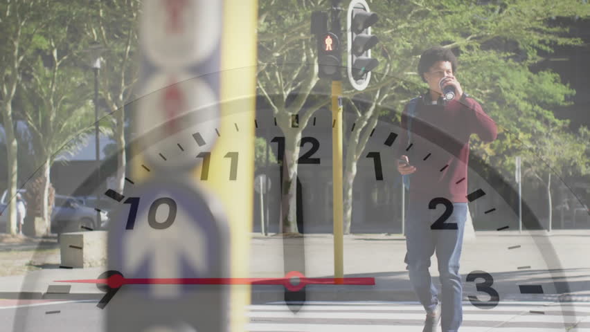 Animation of clock with moving hands over biracial man using smartphone in sunny street. Connection, time, processing, city life, travel and communication, digitally generated video. - Powered by Shutterstock - Get 15% off with code: PIKWIZARD15
