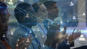 Animation of network of people icons over diverse businesspeople clapping at seminar. Business, connection, teamwork, digital interface and communication, digitally generated video. - Powered by Shutterstock - Get 15% off with code: PIKWIZARD15