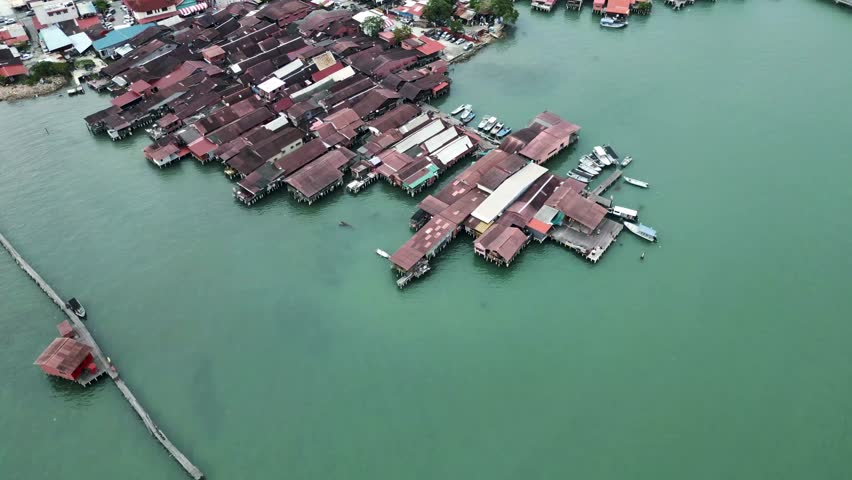 Aerial top down of The Clan Jetties a residential neighbourhood within the city of George Town in the Malaysian state of Penang